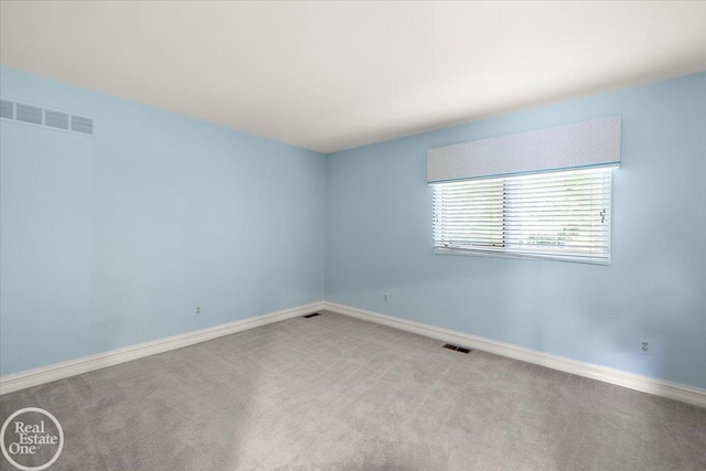 63011 Indian Hills Dr Unit # 1, Washington Twp, MI 48095 - carpeted empty room featuring baseboards