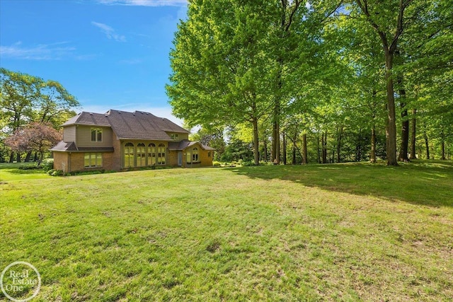 63011 Indian Hills Dr Unit # 1, Washington Twp, MI 48095 - view of grassy yard