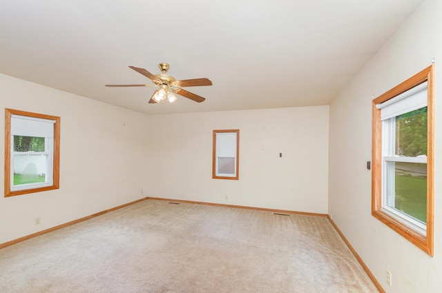 205 E Murphy St, Bay City, MI 48706 - unfurnished room with plenty of natural light, light colored carpet, and baseboards