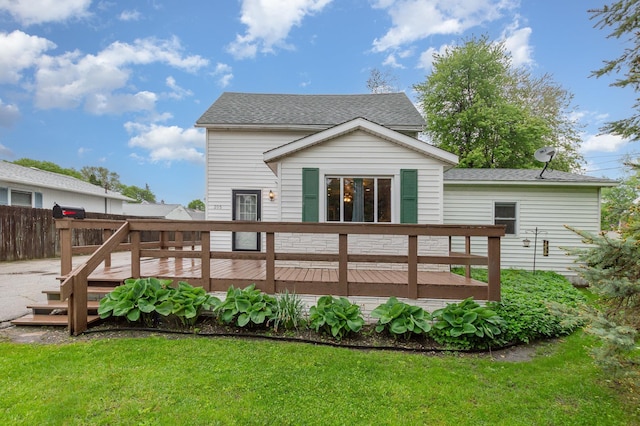 205 E Murphy St, Bay City, MI 48706 - back of property with a deck and roof with shingles