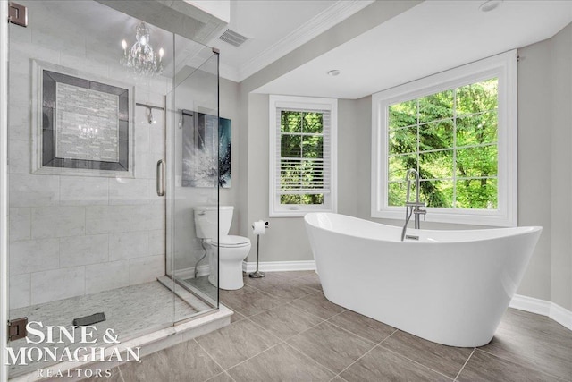55266 Lordona Ln, Shelby Twp, MI 48315 - full bath with baseboards, a freestanding tub, a shower stall, toilet, and ornamental molding