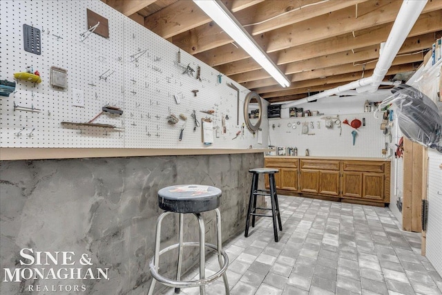 55266 Lordona Ln, Shelby Twp, MI 48315 - bar with a workshop area and brick patterned floors