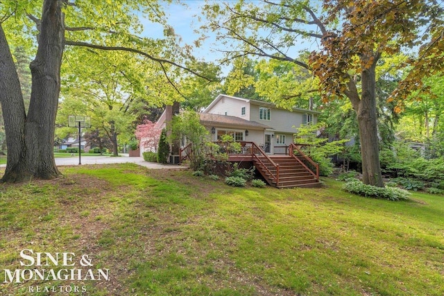 55266 Lordona Ln, Shelby Twp, MI 48315 - rear view of property with stairs, a deck, and a lawn