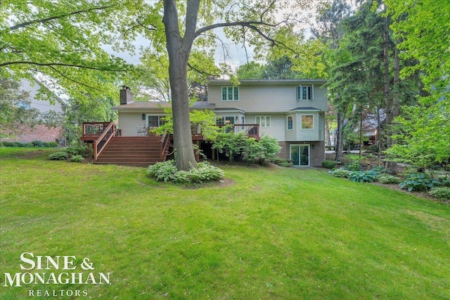 55266 Lordona Ln, Shelby Twp, MI 48315 - back of house featuring a deck, a chimney, a lawn, and stairway