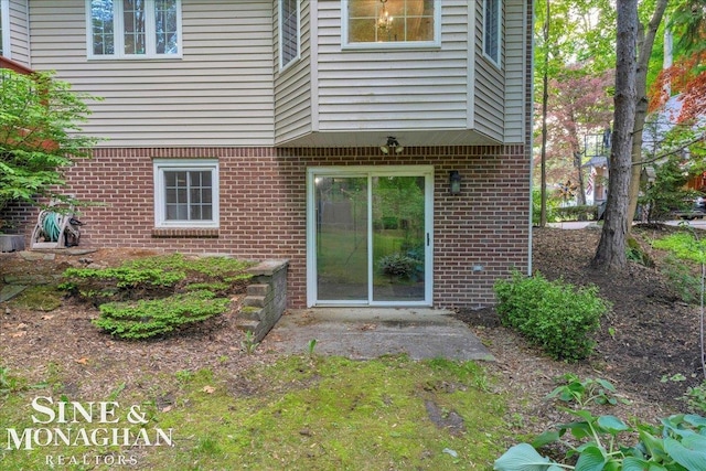 55266 Lordona Ln, Shelby Twp, MI 48315 - doorway to property with brick siding