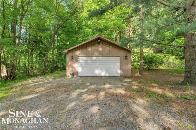 55266 Lordona Ln, Shelby Twp, MI 48315 - detached garage featuring a wooded view