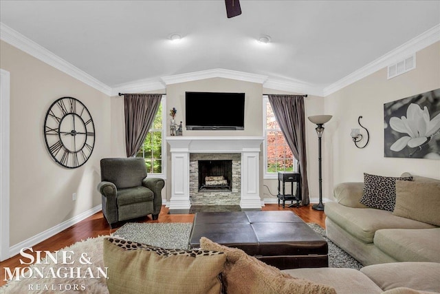 55266 Lordona Ln, Shelby Twp, MI 48315 - living room with ornamental molding, wood finished floors, a fireplace, baseboards, and ceiling fan