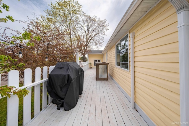 2091 Wilkinson Ave, Marquette, MI 49855 - wooden terrace with a grill