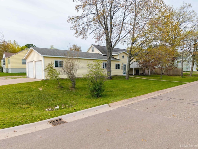 2091 Wilkinson Ave, Marquette, MI 49855 - view of front of house featuring a front lawn and driveway
