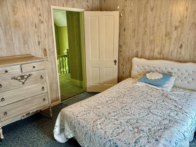 215 Day St, Ironwood, MI 49938 - carpeted bedroom featuring wood walls
