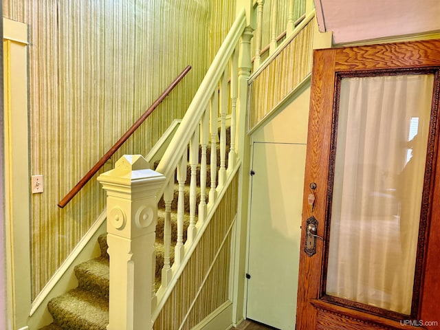 215 Day St, Ironwood, MI 49938 - staircase with wallpapered walls