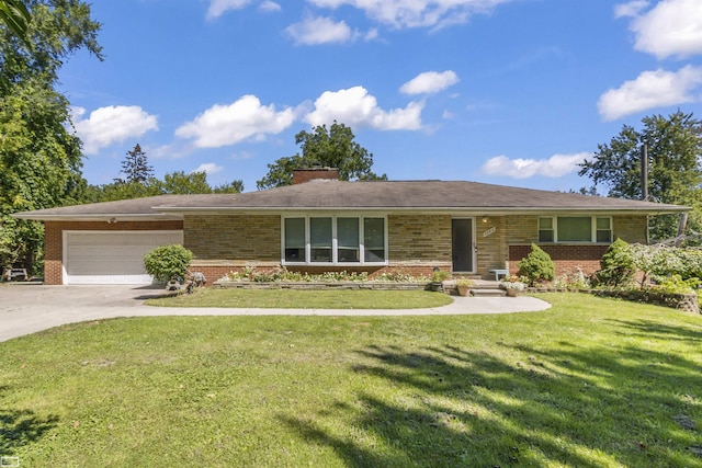 42910 Utica Rd, Sterling Heights, MI 48314 - ranch-style house with brick siding, an attached garage, and a front yard