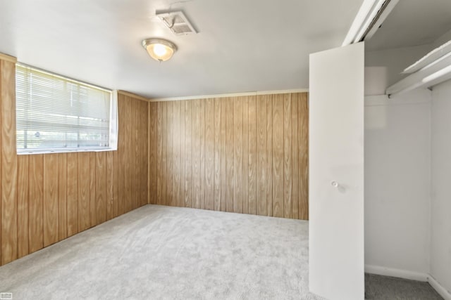 42910 Utica Rd, Sterling Heights, MI 48314 - unfurnished bedroom with carpet and wooden walls