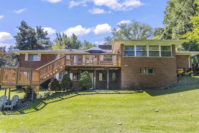 42910 Utica Rd, Sterling Heights, MI 48314 - rear view of property featuring a wooden deck, brick siding, stairway, and a yard