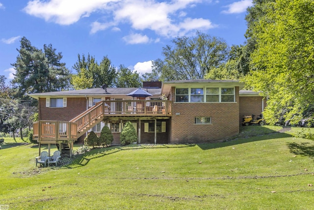 42910 Utica Rd, Sterling Heights, MI 48314 - back of house with brick siding, a deck, a lawn, and stairway