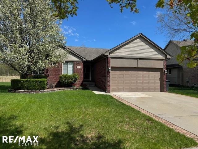 53234 Fox Pointe Dr, New Baltimore, MI 48047 - ranch-style house featuring an attached garage, brick siding, driveway, and a front lawn