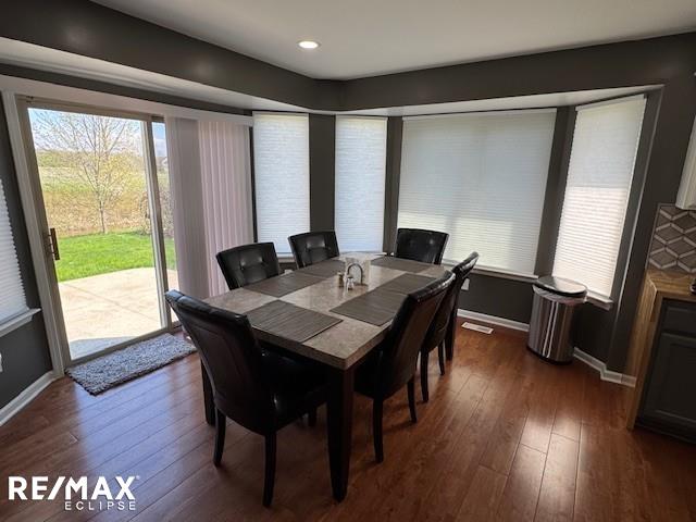 53234 Fox Pointe Dr, New Baltimore, MI 48047 - dining space featuring dark wood-style floors, baseboards, and recessed lighting