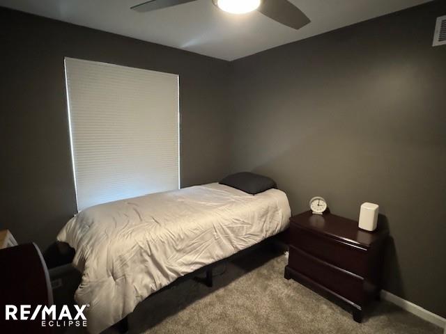 53234 Fox Pointe Dr, New Baltimore, MI 48047 - bedroom featuring carpet flooring, ceiling fan, and baseboards