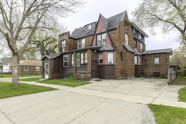 1104 Minnie St, Port Huron, MI 48060 - view of front of home featuring brick siding and a front lawn