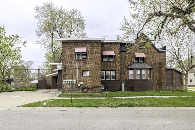 1104 Minnie St, Port Huron, MI 48060 - view of building exterior with concrete driveway