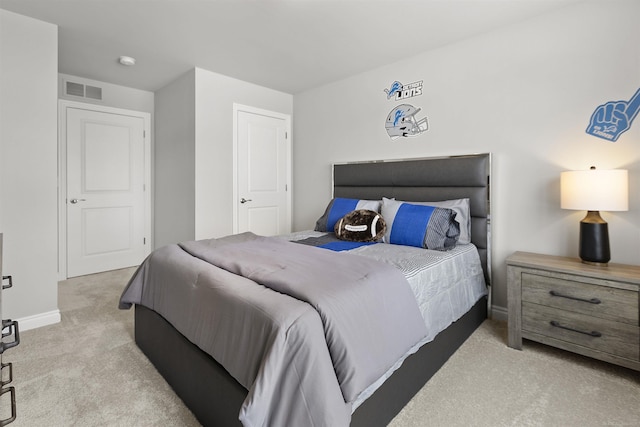 2215 Chase Dr Unit 102, Howell, MI 48855 - carpeted bedroom featuring baseboards