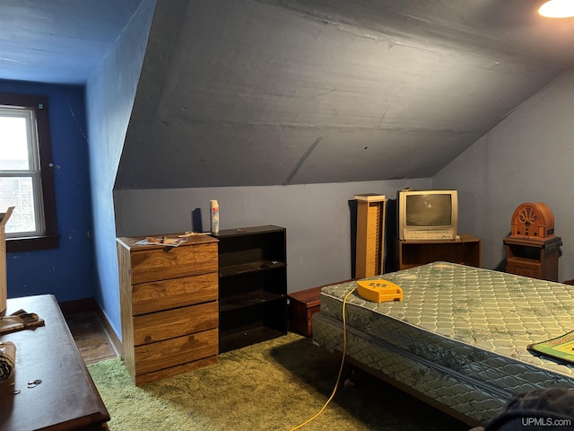 336 E Broad St, Lanse, MI 49946 - carpeted bedroom featuring vaulted ceiling