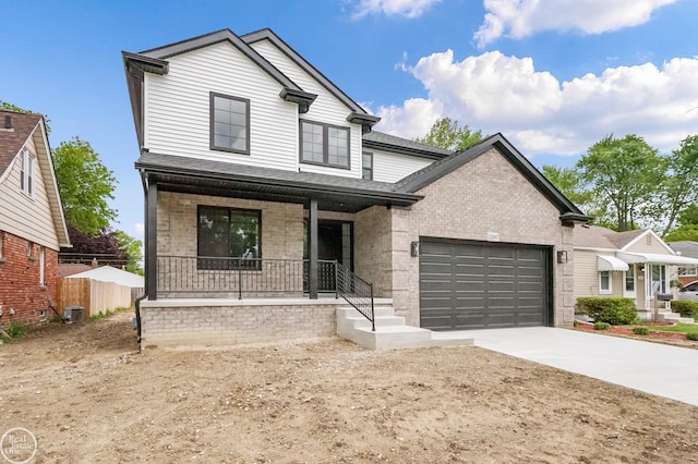 22007 Ridgeway St, Saint Clair Shores, MI 48080 - view of front facade with a porch, a garage, brick siding, concrete driveway, and roof with shingles