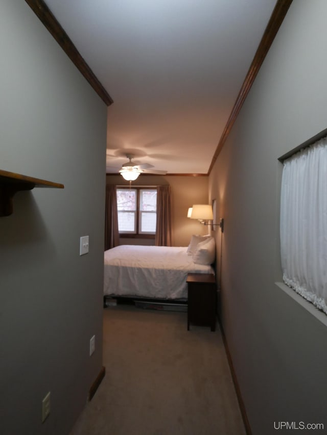 909 Quincy St, Hancock, MI 49930 - bedroom featuring ornamental molding, carpet flooring, ceiling fan, and baseboards