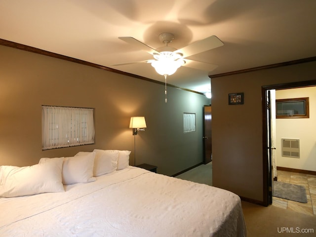 909 Quincy St, Hancock, MI 49930 - bedroom with crown molding, baseboards, light carpet, and a ceiling fan