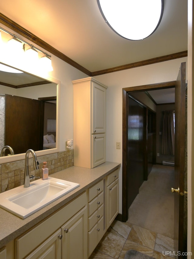 909 Quincy St, Hancock, MI 49930 - bathroom featuring vanity, crown molding, tasteful backsplash, and a baseboard heating unit
