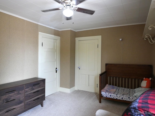 909 Quincy St, Hancock, MI 49930 - carpeted bedroom featuring ornamental molding and ceiling fan