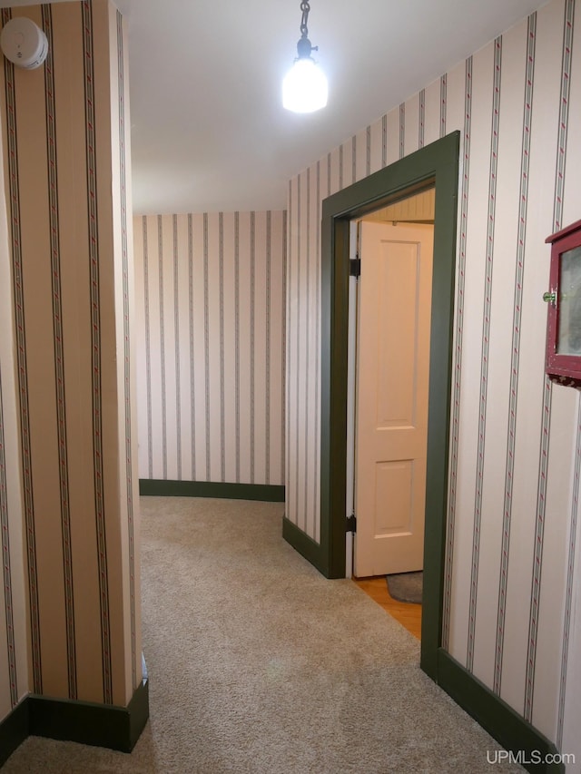 909 Quincy St, Hancock, MI 49930 - hallway featuring carpet flooring