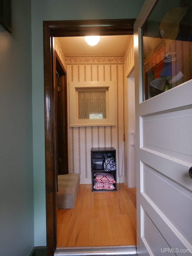 909 Quincy St, Hancock, MI 49930 - sauna with wallpapered walls and wood finished floors