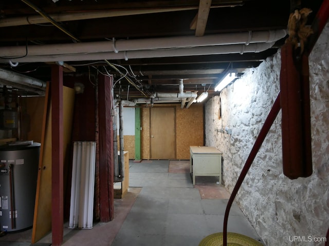 909 Quincy St, Hancock, MI 49930 - unfinished below grade area featuring water heater
