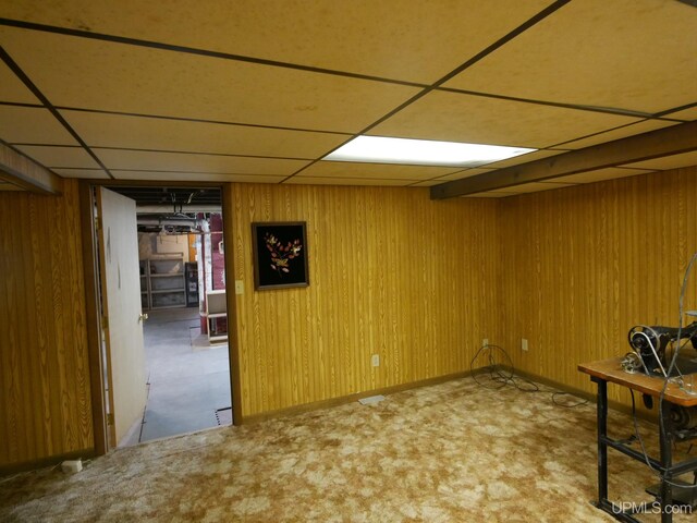 909 Quincy St, Hancock, MI 49930 - finished below grade area featuring a drop ceiling and wooden walls