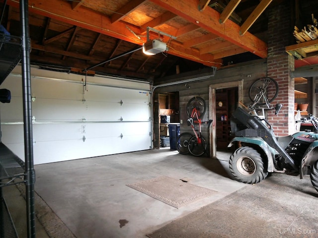 909 Quincy St, Hancock, MI 49930 - garage with a garage door opener