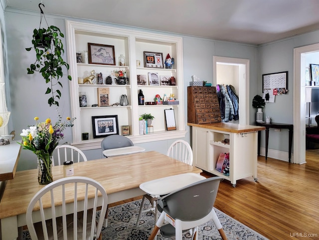 304 E Lincoln St, Negaunee, MI 49866 - dining space with wood finished floors