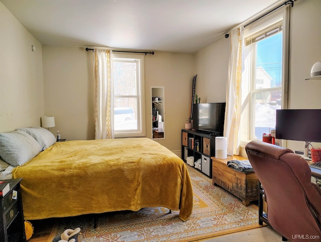 304 E Lincoln St, Negaunee, MI 49866 - bedroom featuring multiple windows