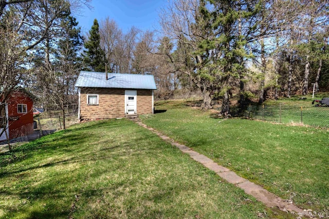 338 E Tamarack St, Ironwood, MI 49938 - view of yard with an outbuilding