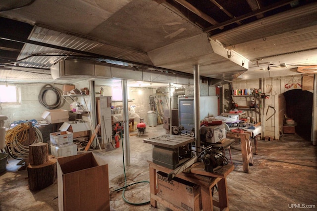338 E Tamarack St, Ironwood, MI 49938 - below grade area featuring a workshop area