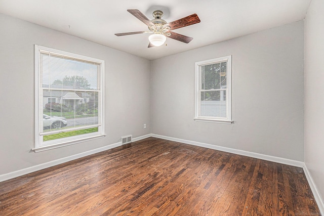 2678 Griffith Ave, Berkley, MI 48072 - unfurnished room featuring baseboards, dark wood-style floors, and ceiling fan