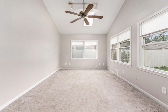 2678 Griffith Ave, Berkley, MI 48072 - carpeted empty room with lofted ceiling, plenty of natural light, baseboards, and ceiling fan