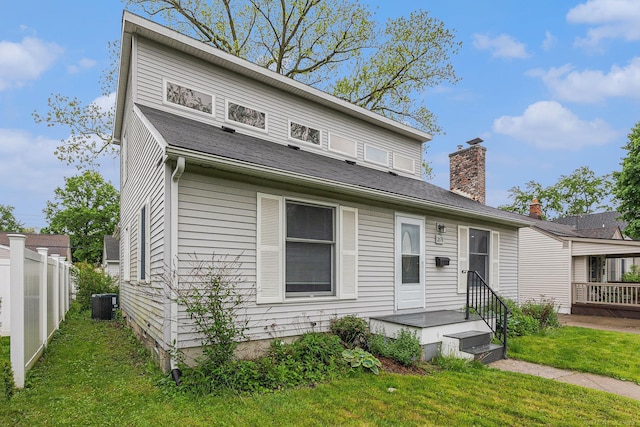 2678 Griffith Ave, Berkley, MI 48072 - view of front of house with central AC unit and a chimney