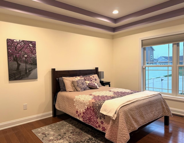 5266 Brook Hollow Ave, Bay City, MI 48706 - bedroom featuring dark wood-type flooring, multiple windows, baseboards, and recessed lighting