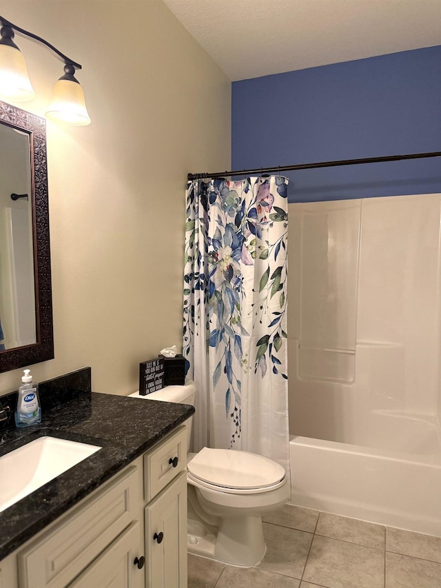 5266 Brook Hollow Ave, Bay City, MI 48706 - bathroom featuring toilet, tile patterned floors, vanity, and shower / bath combo