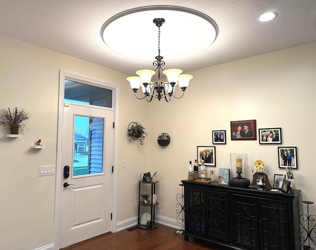 5266 Brook Hollow Ave, Bay City, MI 48706 - entrance foyer with dark wood-style floors, a chandelier, baseboards, and recessed lighting