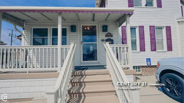 2884 Fort St, Lincoln Park, MI 48146 - doorway to property featuring covered porch