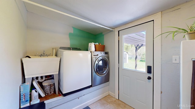 422 Washington St, Ishpeming, MI 49849 - washroom featuring washer and dryer