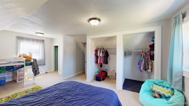 422 Washington St, Ishpeming, MI 49849 - bedroom with a textured ceiling, carpet, and baseboards