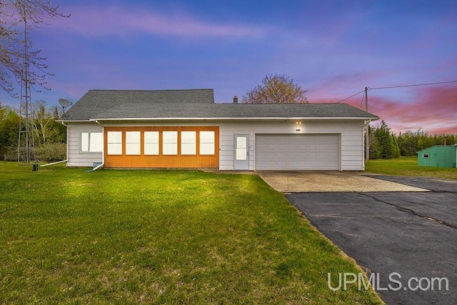 1782 H Rd, Bark River, MI 49807 - view of front of home featuring a front lawn and asphalt driveway
